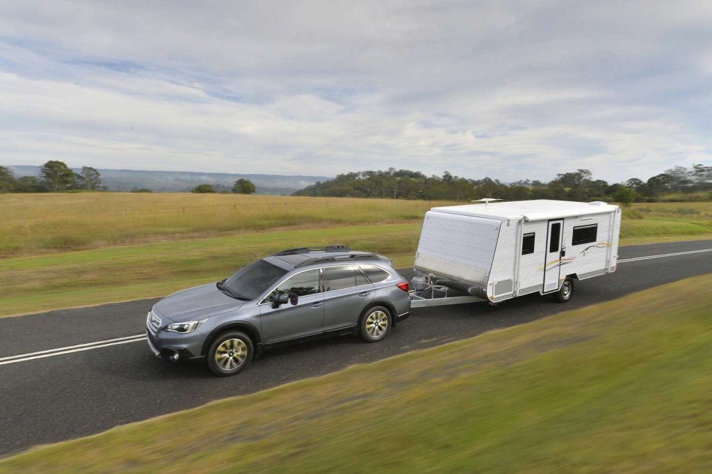 Subaru Outback Towing a Travel Trailer