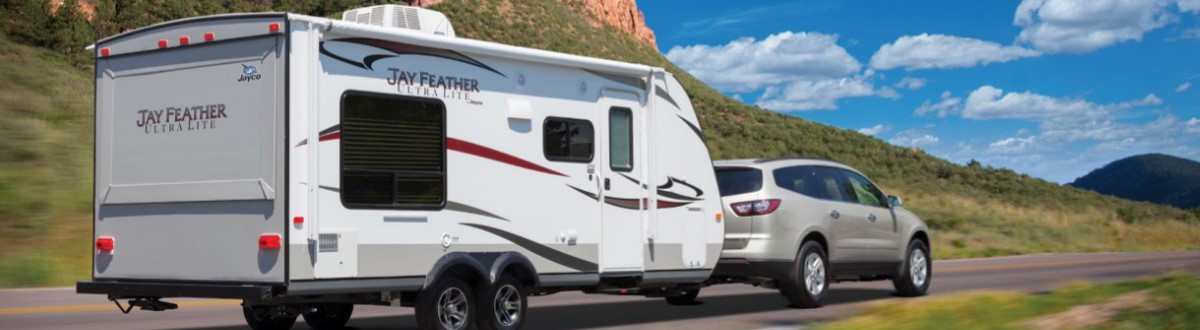 Jayco Jay Feather on the road. Of Valley RV Supercenter at 619 Washington Ave N